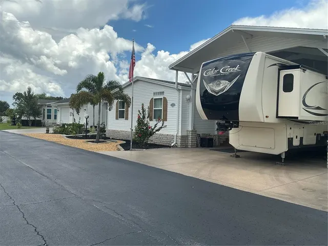 a view of a car park in front of house
