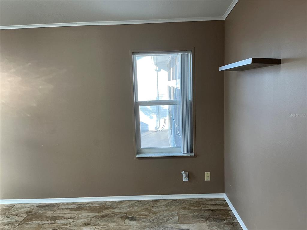236 Allies Pass, Unit 363 Frostproof, FL 33843 - Photo 40 of 51 a view of a room with window