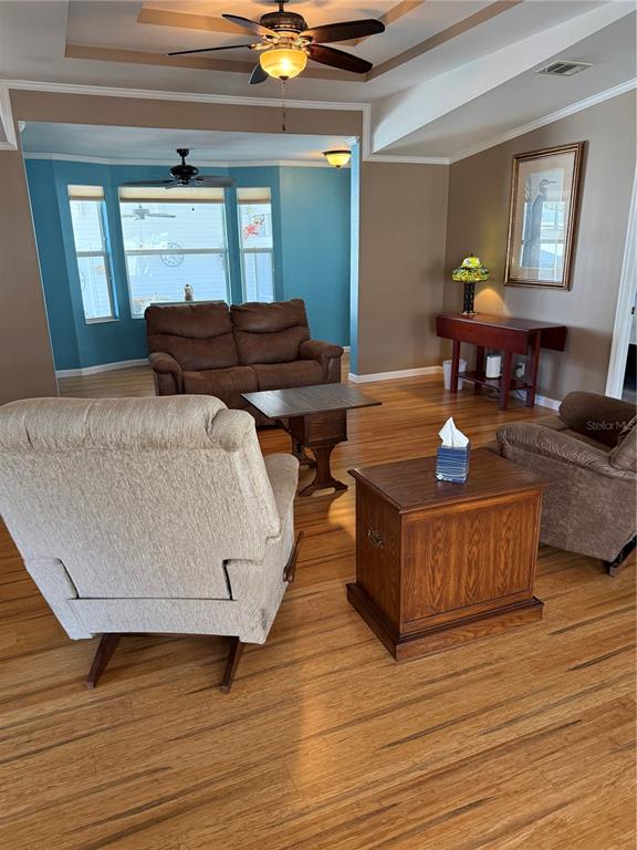236 Allies Pass, Unit 363 Frostproof, FL 33843 - Photo 45 of 51 a living room with furniture and a table