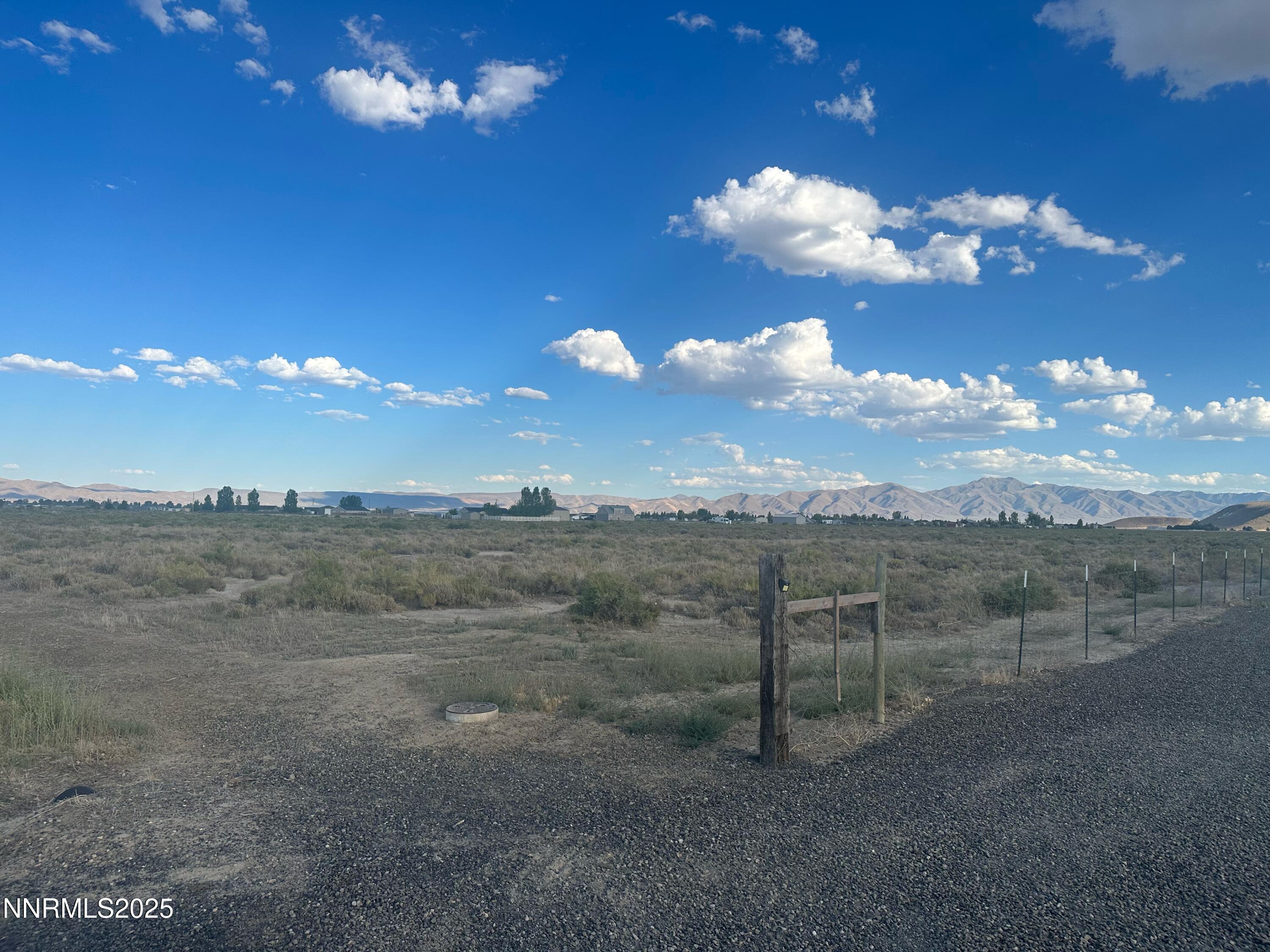 625 Yellow Brick Road Battle Mountain, NV 89820 - Photo 4 of 9 a view of a yard with a tree