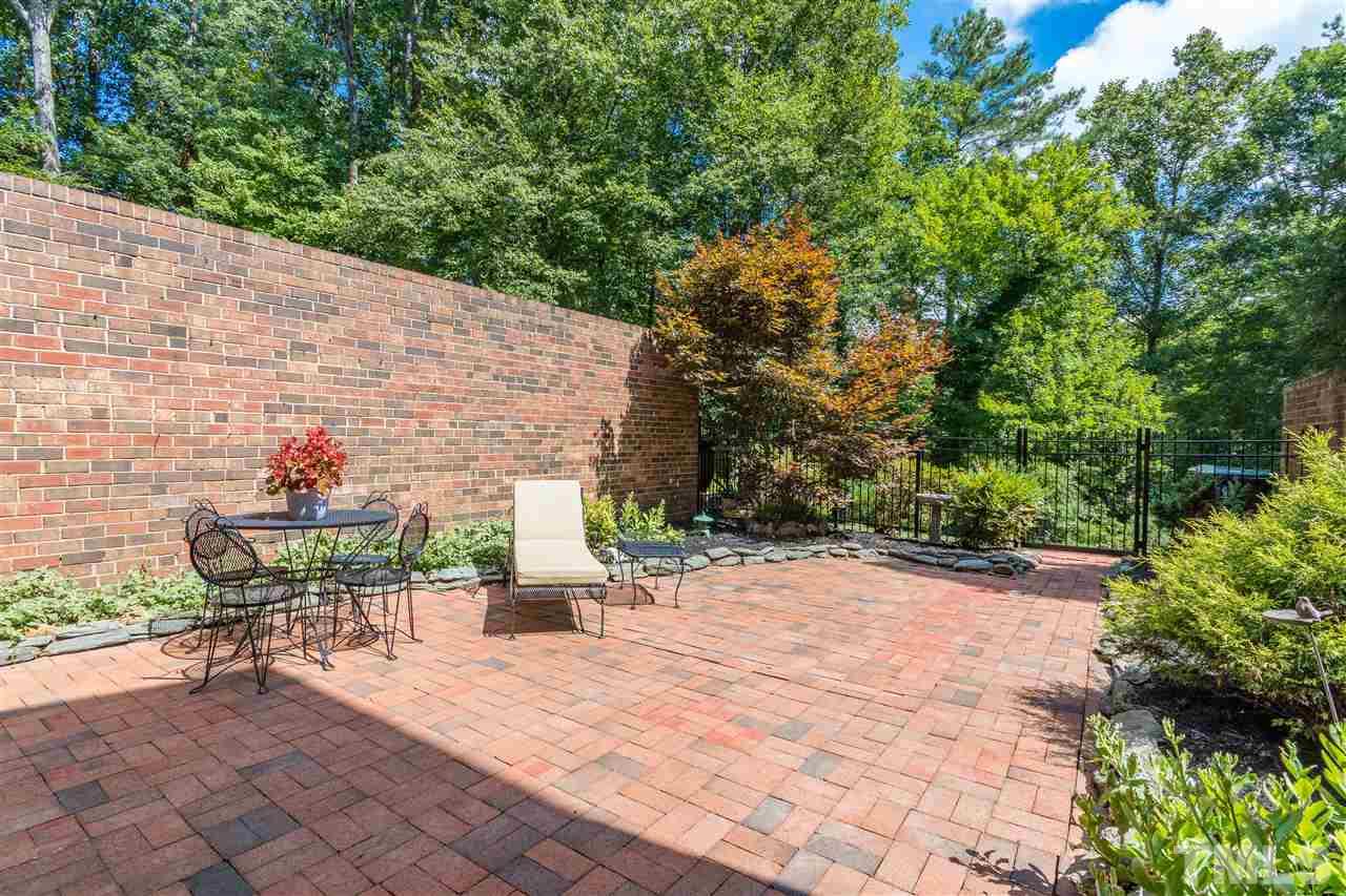 2880 Wycliff Road Raleigh, NC 27607 - Photo 18 of 23 a view of a backyard with sitting area