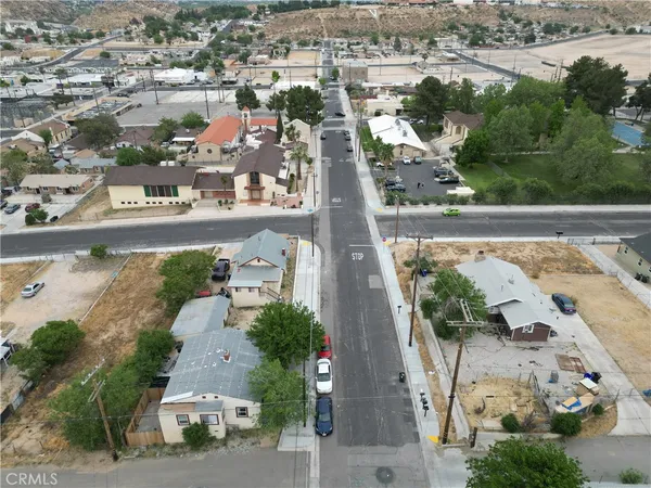 an aerial view of residential house with outdoor space