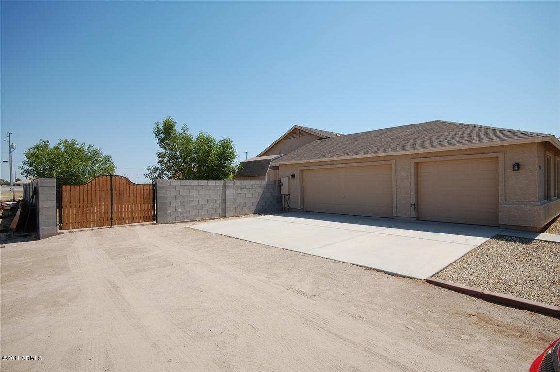 2306 South Tuthill Road Buckeye, AZ 85326 - Photo 30 of 30 Garage from Outside