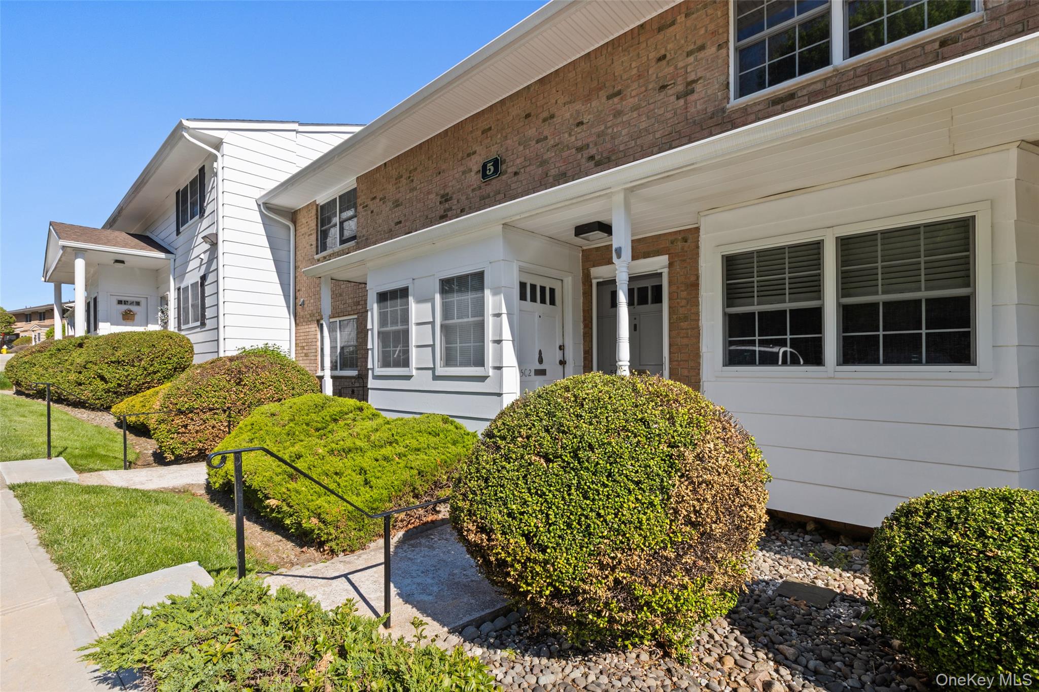 1840 Crompond Road, Unit 5C2 Peekskill, NY 10566 - Photo 18 of 27 a view of a house with backyard