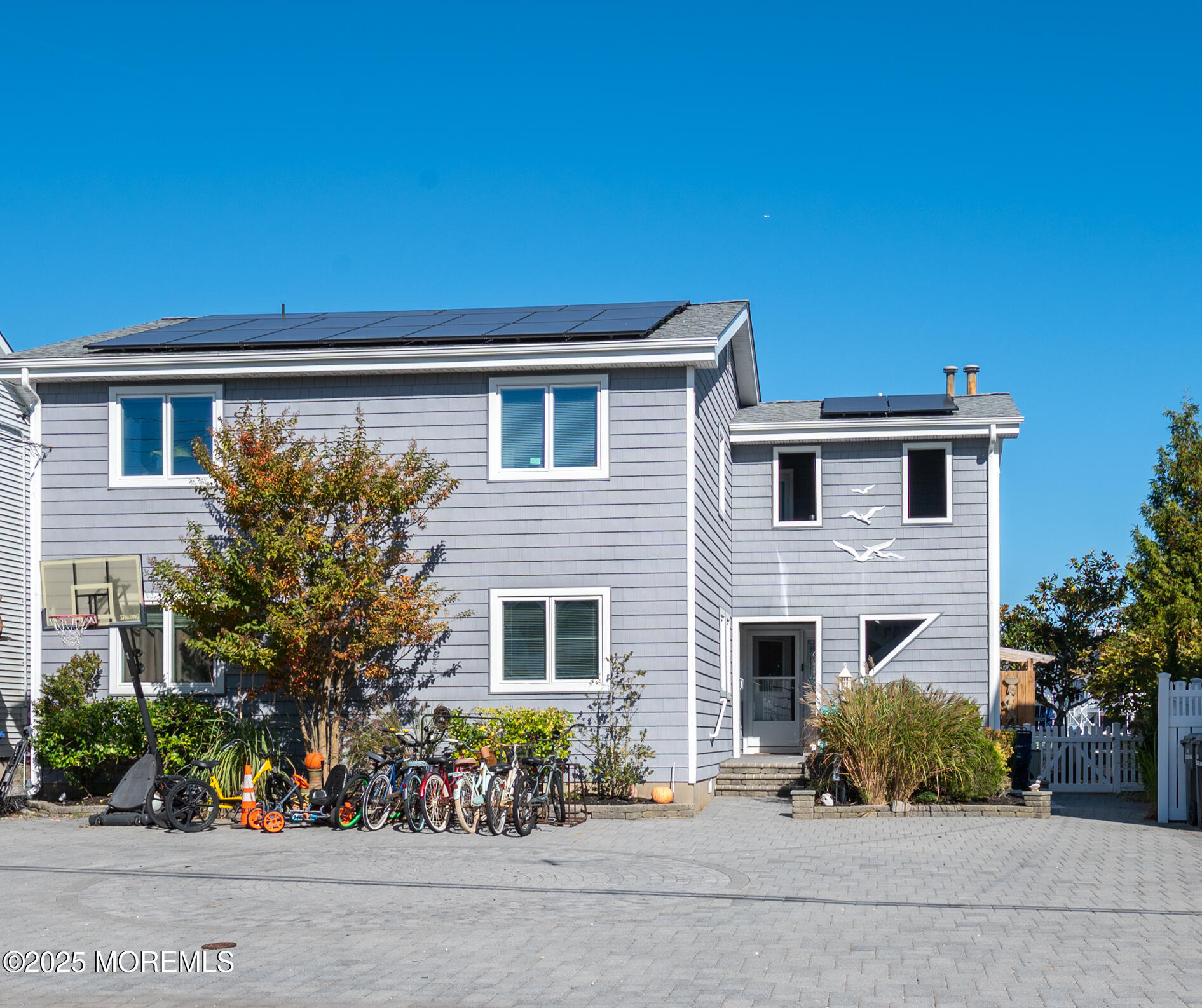 408 Coolidge Avenue, Unit 2 Seaside Heights, NJ 08751 - Photo 1 of 9 front view of house with a yard