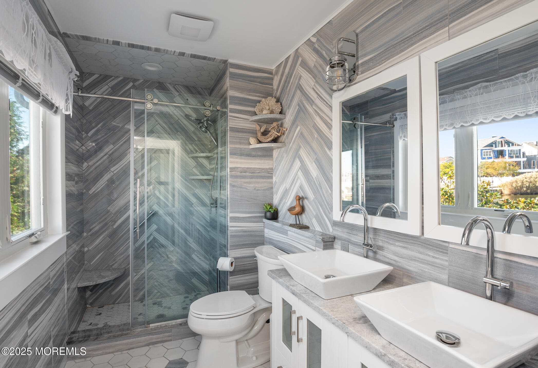 408 Coolidge Avenue, Unit 2 Seaside Heights, NJ 08751 - Photo 7 of 9 a bathroom with a sink toilet and shower