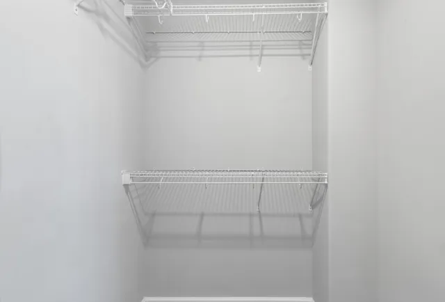 a view of small space with racks on the wall