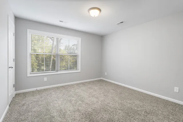 an empty room with a natural light