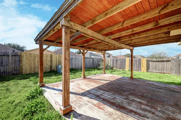 a patio with a yard