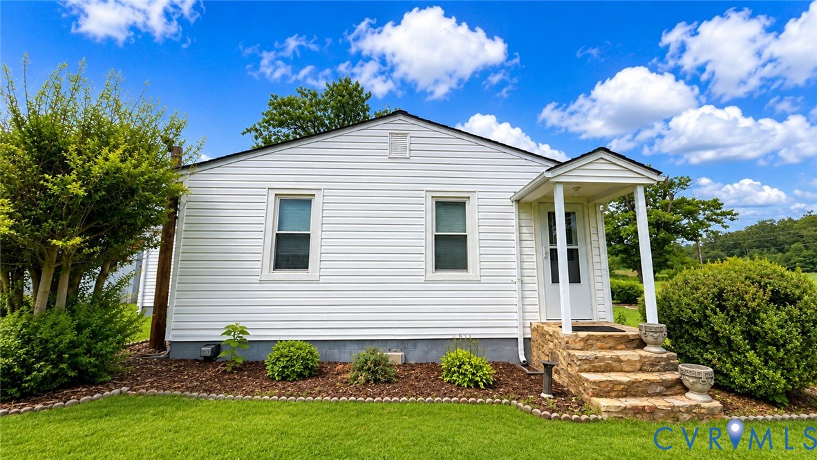 5560 West Hoover Road Reva, VA 22735 - Photo 5 of 32 White siding exterior with a covered porch entry