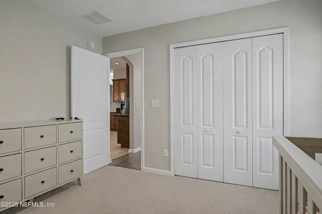 a white bath tub sitting next to a window