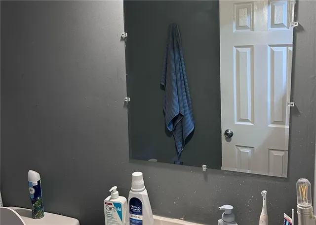 a bathroom with a toilet and a sink