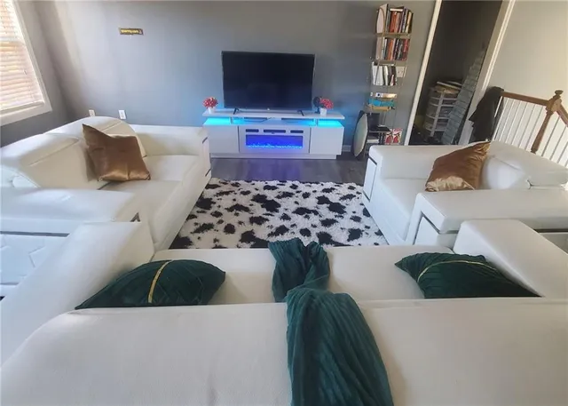 a bedroom with a bed and television