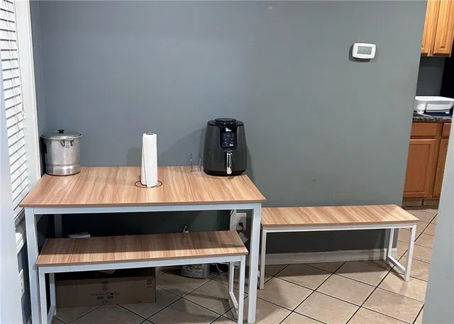 a room with furniture and a flat screen tv