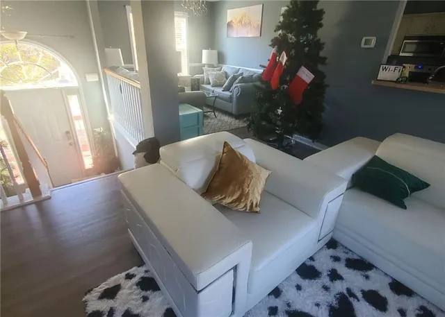 a kitchen with refrigerator and sink