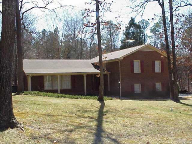 4049 King Charles Road Durham, NC 27707 - Photo 1 of 1 a front view of a house with a yard