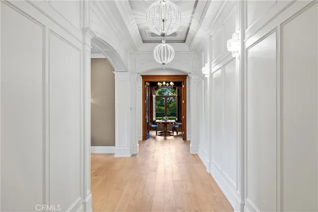 a view of a house with a yard and lake view