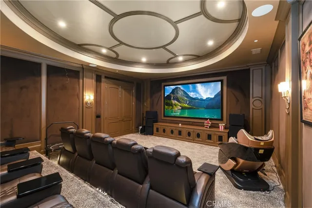 a front view of a house with a yard swimming pool and outdoor seating