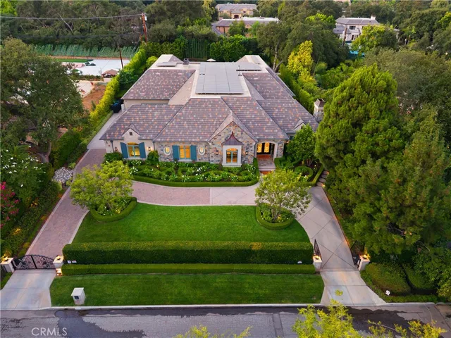 a spacious bedroom with a large bed and a large window
