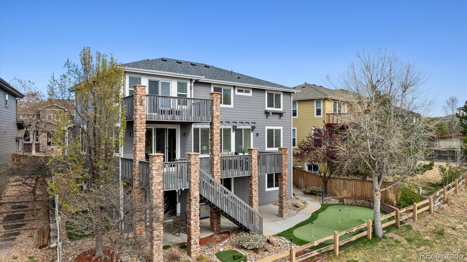 11025 Grayledge Circle Highlands Ranch, CO 80130 - Photo 35 of 46 a front view of a house with balcony