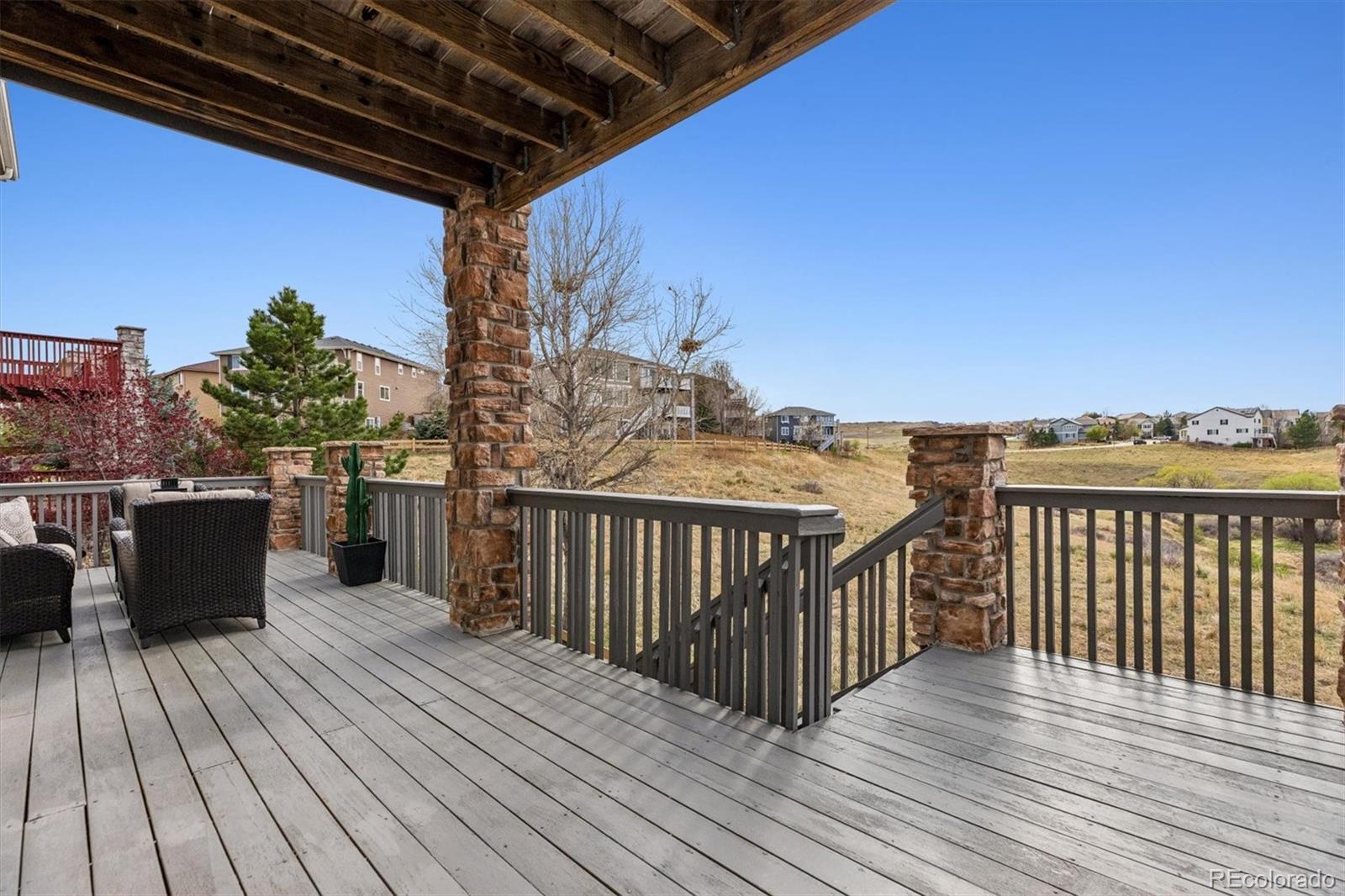 11025 Grayledge Circle Highlands Ranch, CO 80130 - Photo 36 of 46 a view of deck with patio