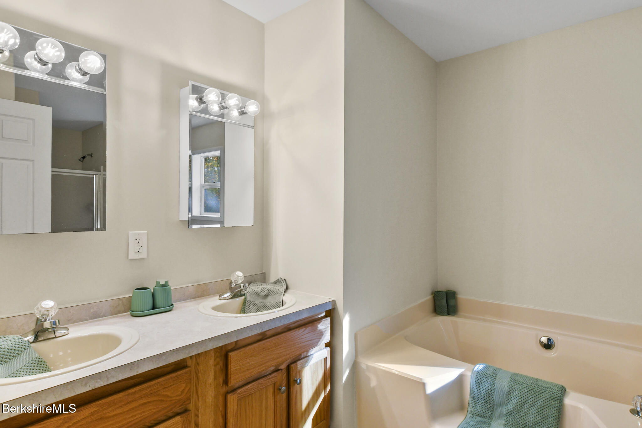 130 High St Hill Road Windsor, MA 01270 - Photo 35 of 50 a bathroom with a sink double vanity granite tub shower and a mirror