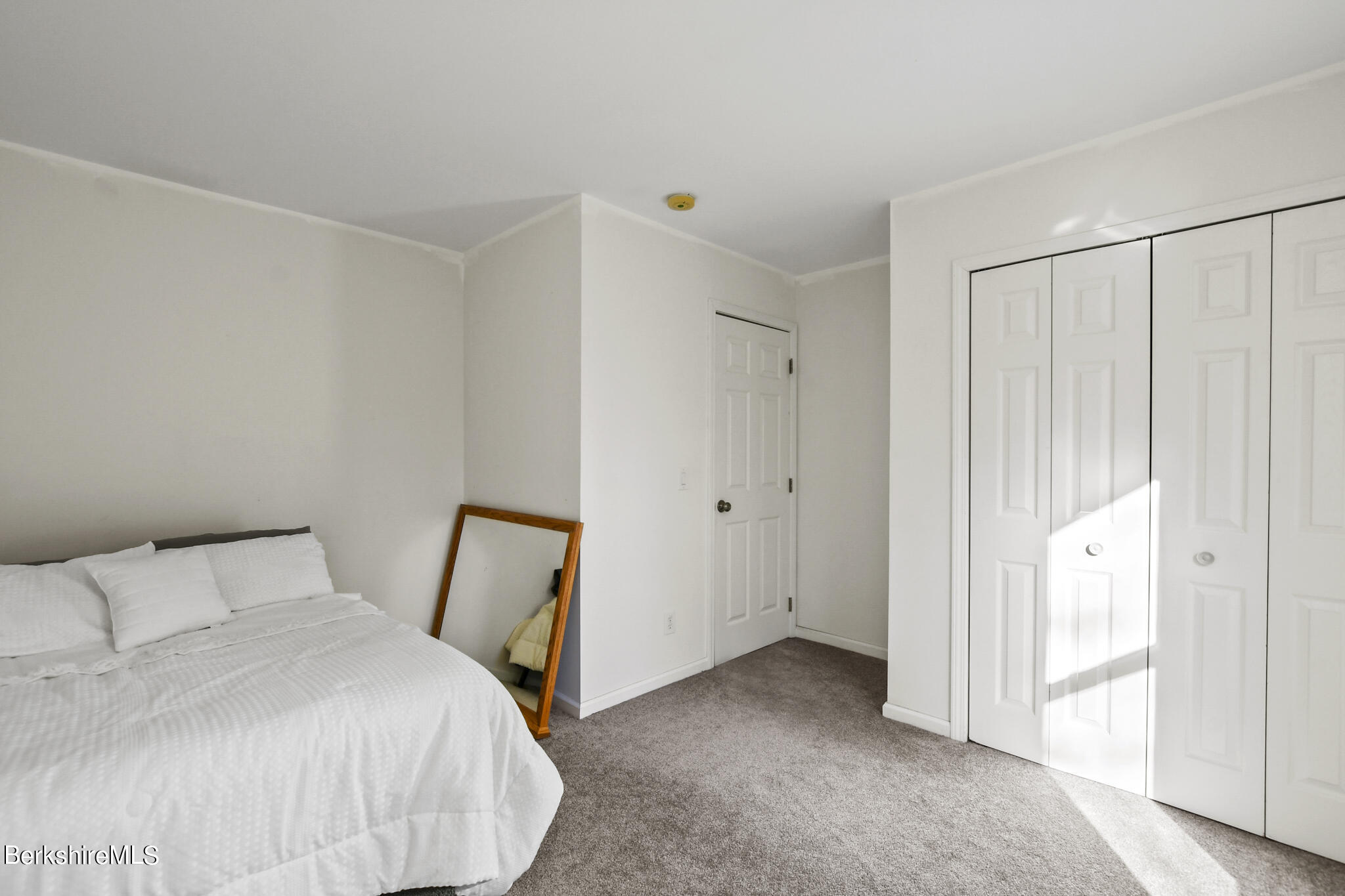 130 High St Hill Road Windsor, MA 01270 - Photo 39 of 50 a bedroom with a bed and a closet
