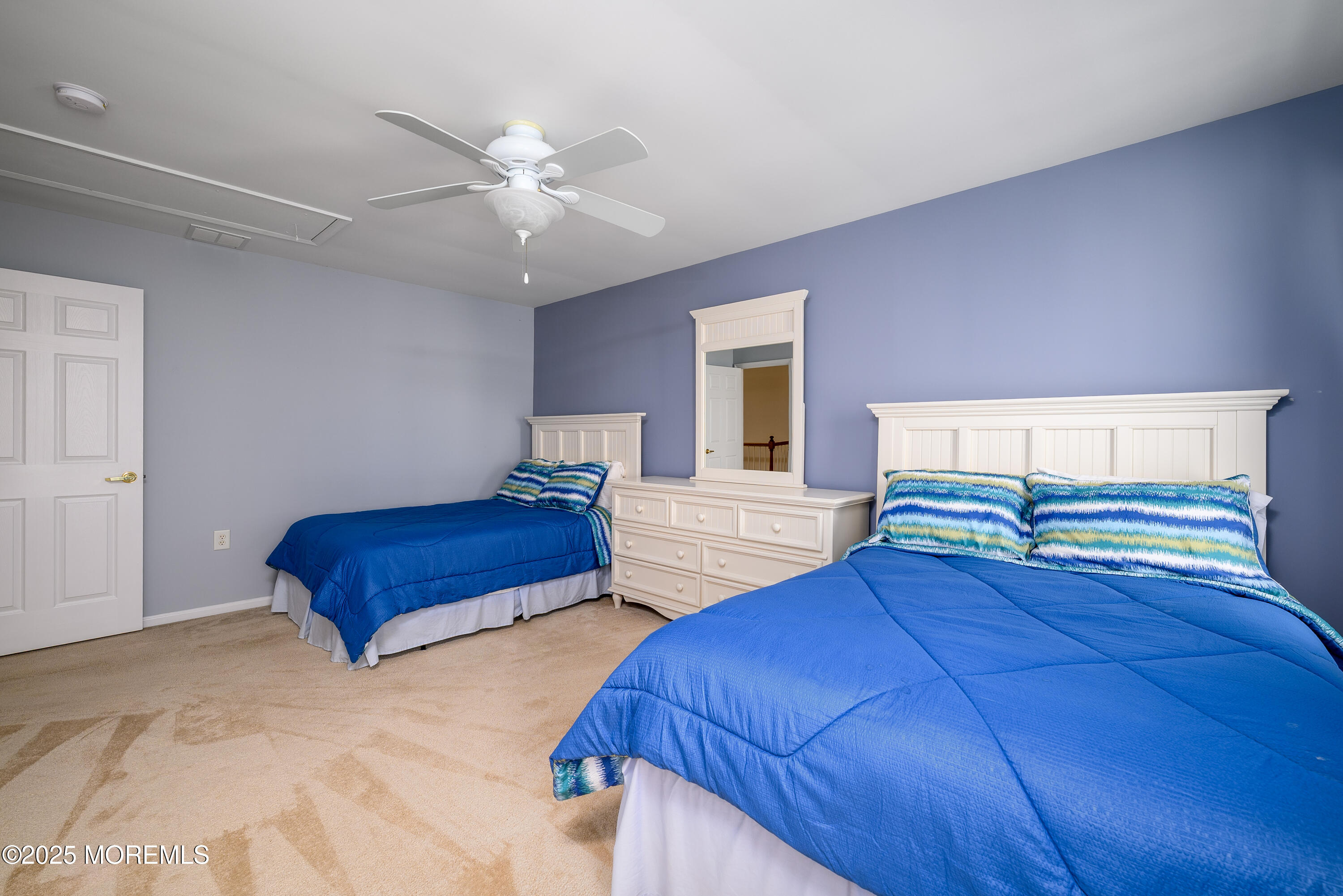 38 Strathmere Street Waretown, NJ 08758 - Photo 33 of 50 a bedroom with two beds and painting on the wall
