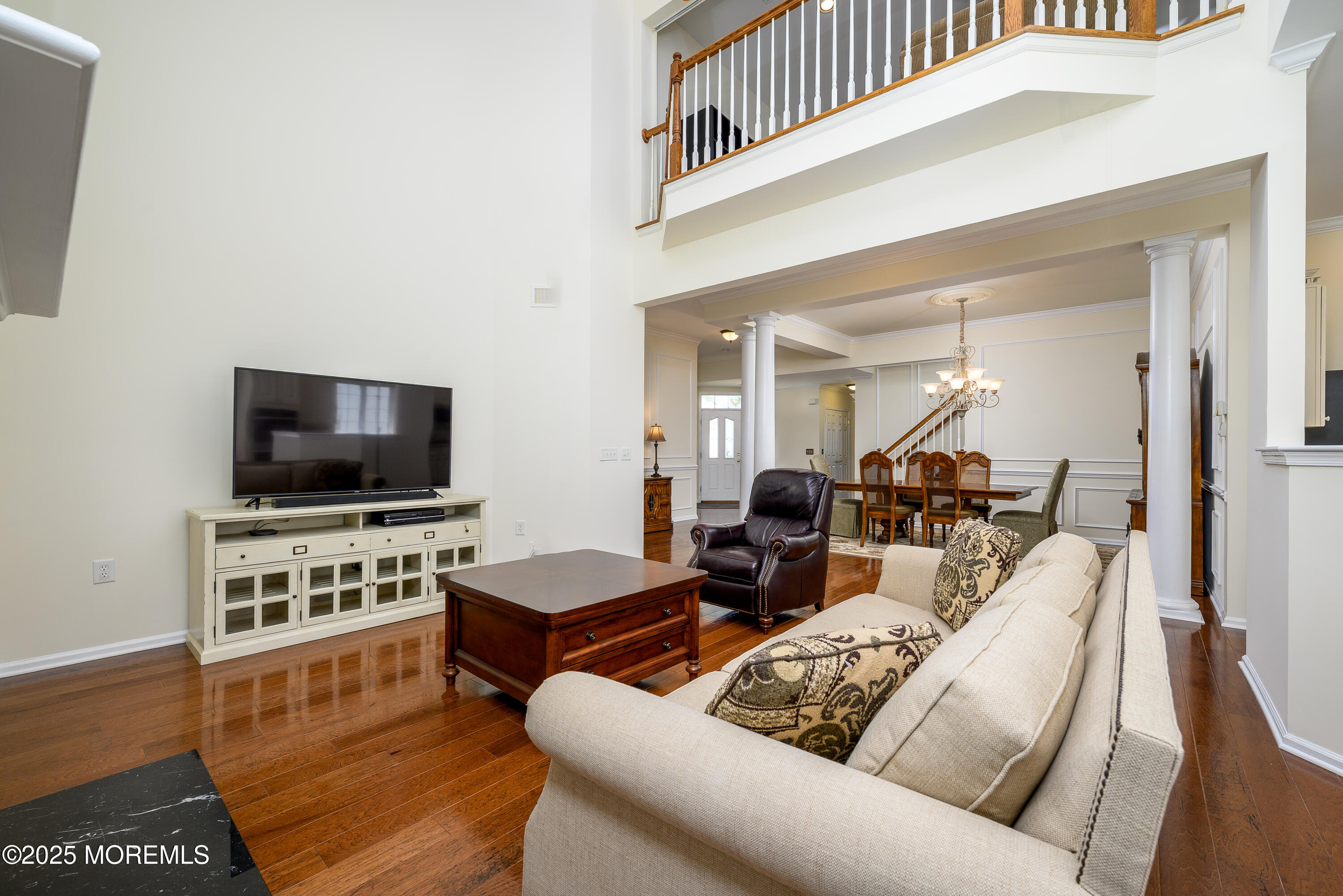38 Strathmere Street Waretown, NJ 08758 - Photo 10 of 50 a living room with furniture and a flat screen tv