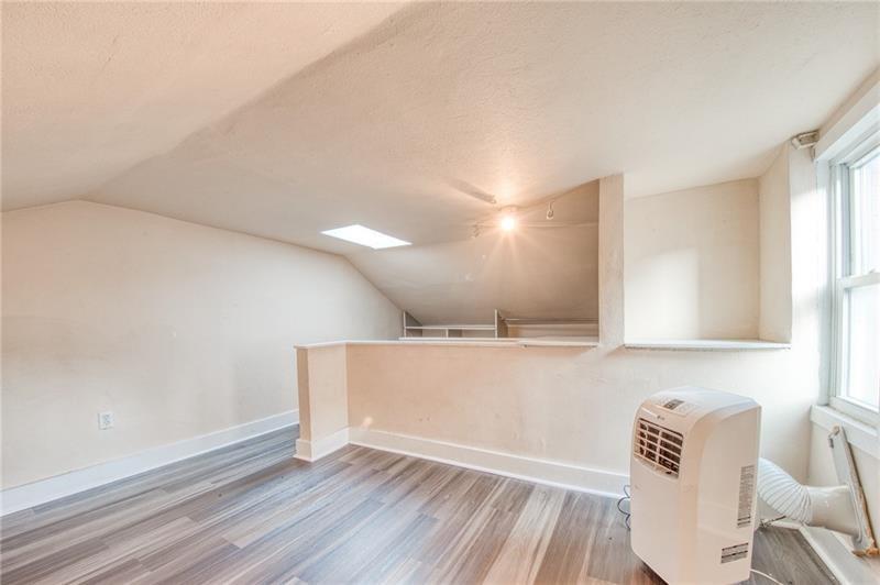 65 South 14th Street Pittsburgh, PA 15203 - Photo 17 of 24 a view of kitchen with sink and wooden floor