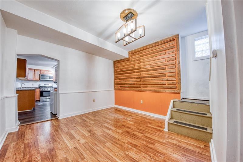 65 South 14th Street Pittsburgh, PA 15203 - Photo 3 of 24 a view of a livingroom with wooden floor and a ceiling fan