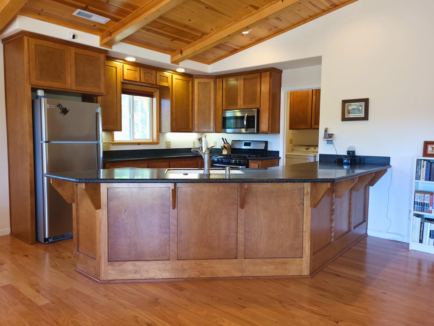2733 Emco Road Rail Road Flat, CA 95248 - Photo 16 of 41 a kitchen with stainless steel appliances granite countertop a sink a refrigerator and a stove