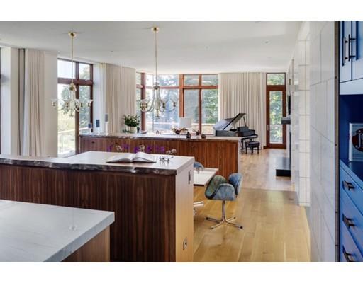 9 Sumner Lane Belmont, MA 02478 - Photo 12 of 29 a kitchen with a table chairs and a view of kitchen