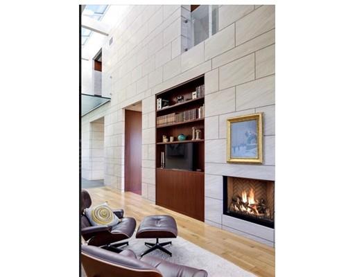 9 Sumner Lane Belmont, MA 02478 - Photo 13 of 29 a living room with furniture and a fireplace