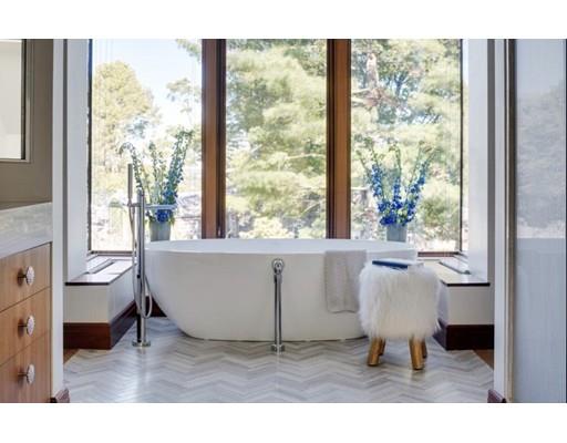 9 Sumner Lane Belmont, MA 02478 - Photo 20 of 29 a living room with a window and a table