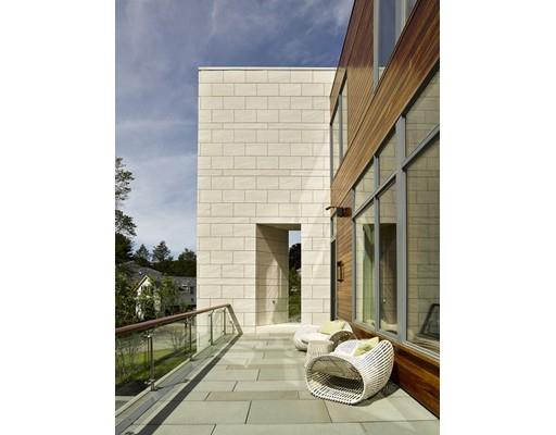 9 Sumner Lane Belmont, MA 02478 - Photo 27 of 29 a front view of a house with outdoor seating