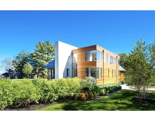 9 Sumner Lane Belmont, MA 02478 - Photo 3 of 29 a front view of a house with a yard