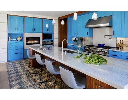 9 Sumner Lane Belmont, MA 02478 - Photo 10 of 29 a kitchen with granite countertop a stove a sink and a wooden cabinets