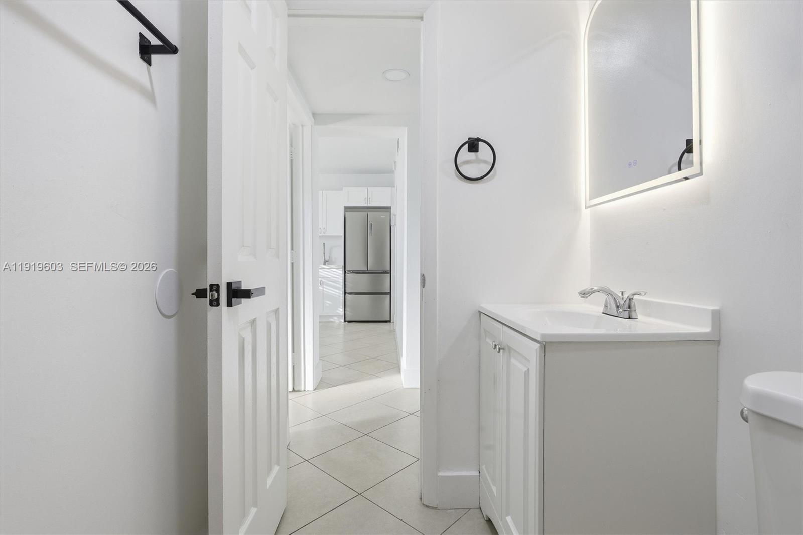 2445 Southwest 18th Street, Unit 3 Miami, FL 33145 - Photo 16 of 18 a bathroom with a sink toilet and shower