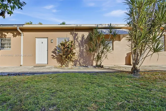 a view of a yard with an outdoor space