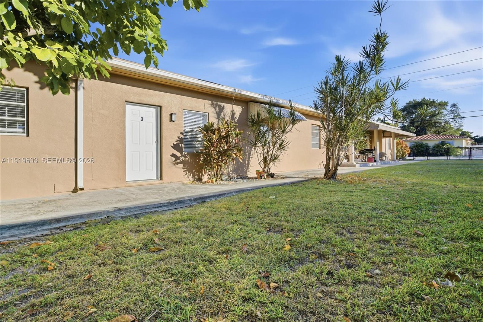 2445 Southwest 18th Street, Unit 3 Miami, FL 33145 - Photo 5 of 18 a view of a back yard of the house