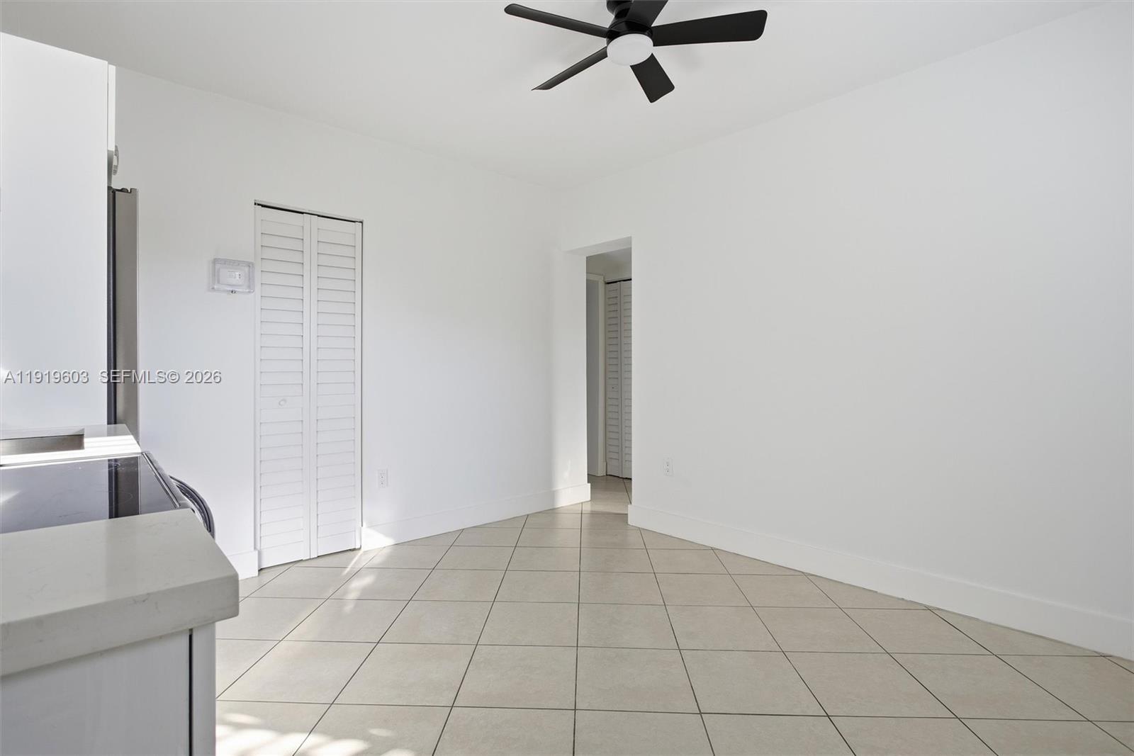 2445 Southwest 18th Street, Unit 3 Miami, FL 33145 - Photo 9 of 18 a view of an empty room and window