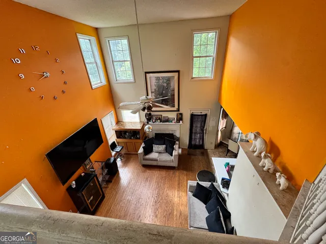 a view of backyard of house with seating space