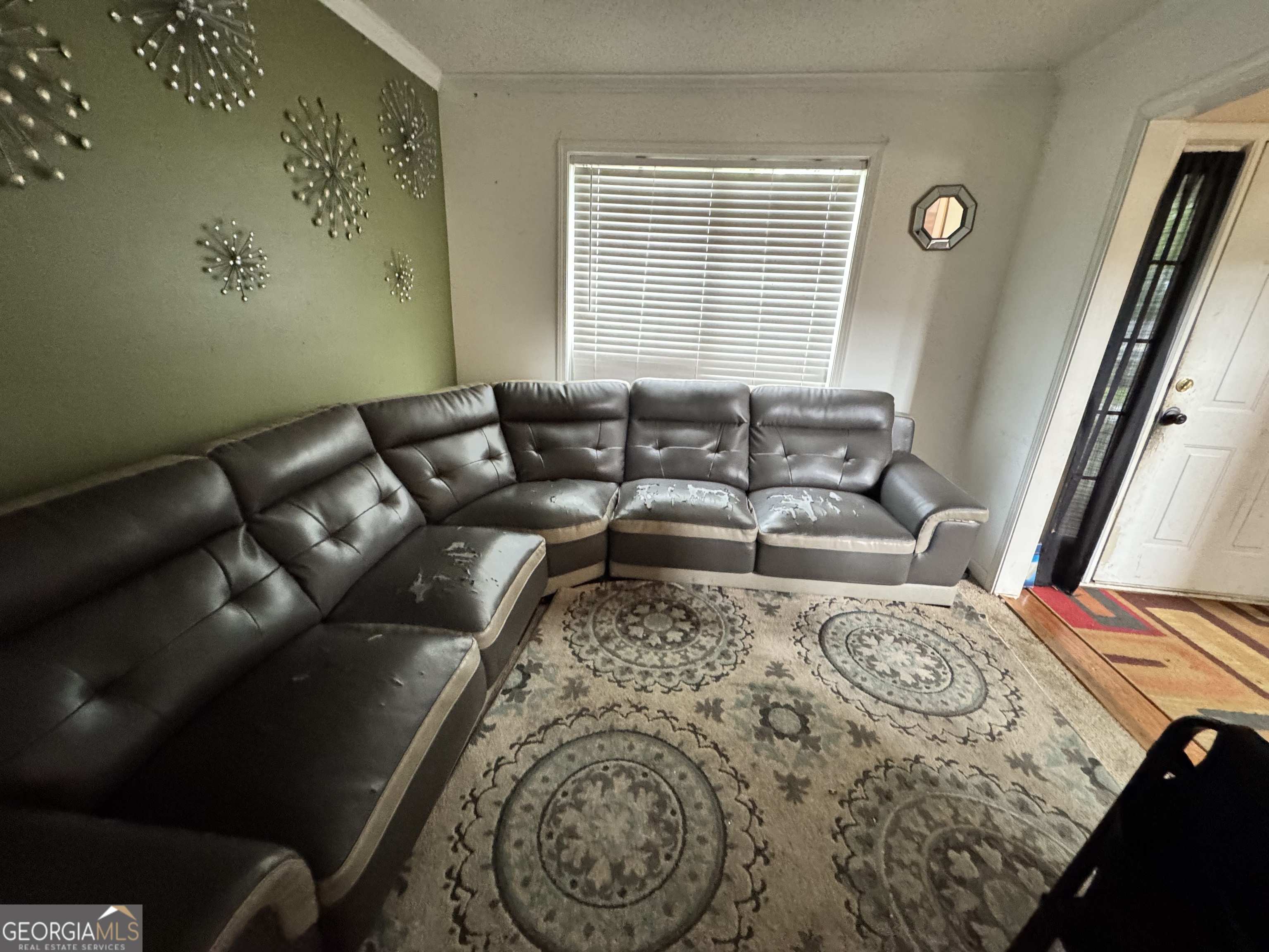 2487 Courtney Renea Drive Dacula, GA 30019 - Photo 7 of 16 a bed sitting in a bedroom next to a window