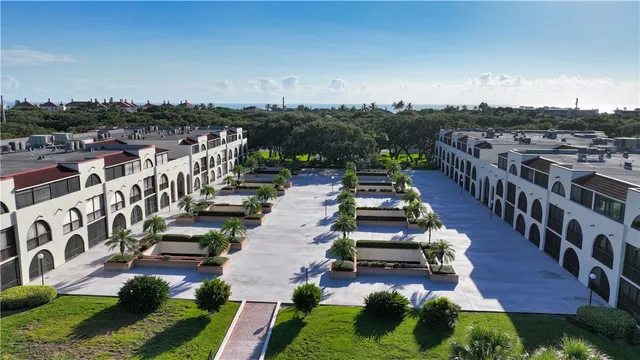 a view of a yard with an outdoor seating