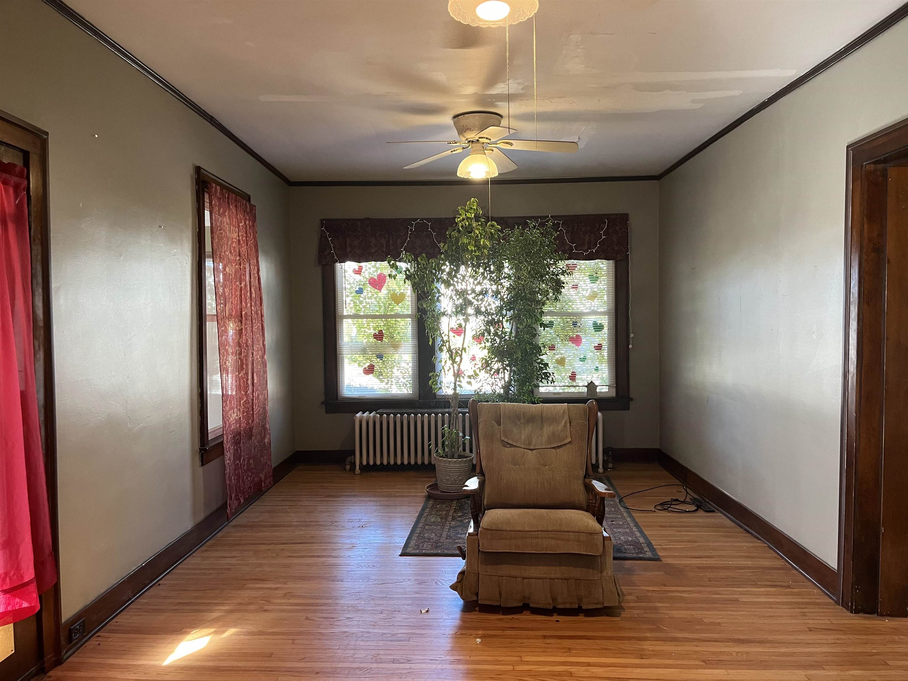 504 9th Street LaSalle, IL 61301 - Photo 11 of 16 a living room with furniture and a large window