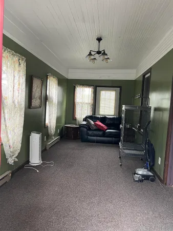 a view of a livingroom with furniture