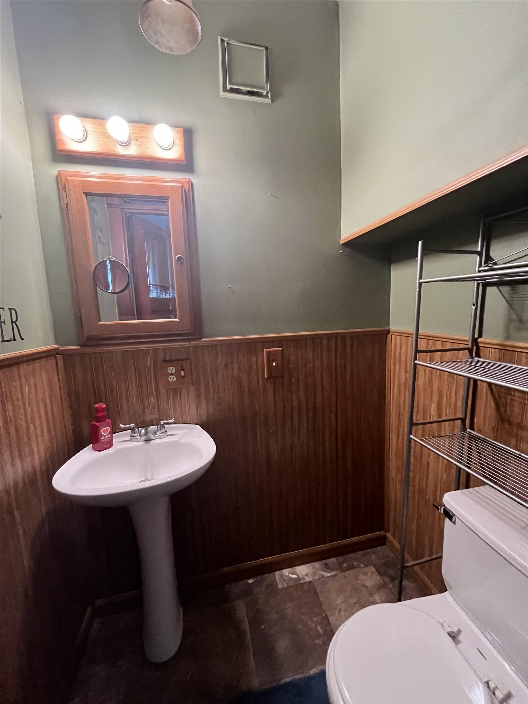 504 9th Street LaSalle, IL 61301 - Photo 6 of 16 a bathroom with a sink and a mirror
