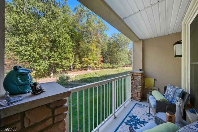 a view of balcony with furniture