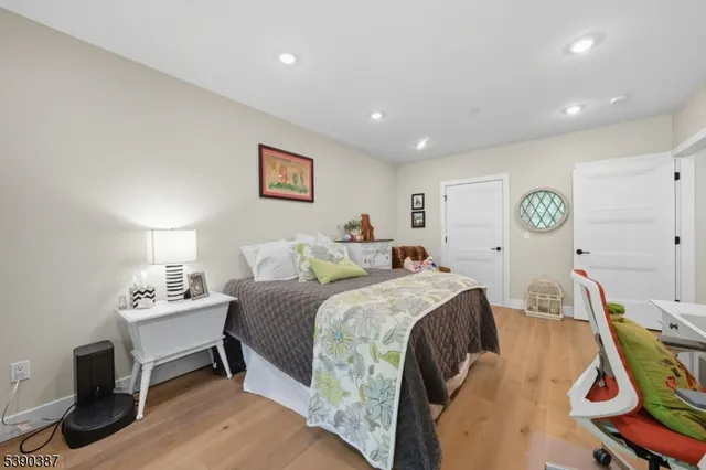 a bedroom with a bed and a table in it